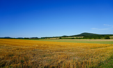 Obraz premium Countryside near Schauenburg. Nature with hills and fields. 