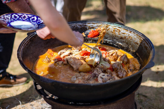 Dimlama cooked with vegetables and chicken meat. Kyzylkum, Uzbekistan.