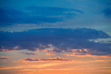 Fototapeta na wymiar Sunset with dramatic cloudy sky