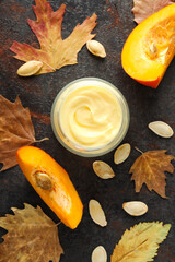 Concept of different cosmetic products, Pumpkin cosmetics, top view