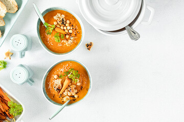 Vegetarian autumn pumpkin and carrot soup with chickpeas and quinoa. Comfort food, autumn-winter...