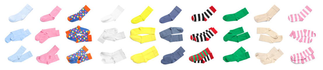 Set with pairs of different socks on white background, top view. Banner design
