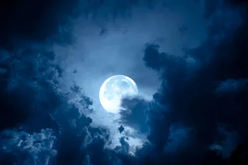 Papier Peint photo Pleine lune Night sky with full moon. Dramatic clouds in mystic moonlight. Large bright moon as concept of mystery, midnight, gothic time and spooky theme.