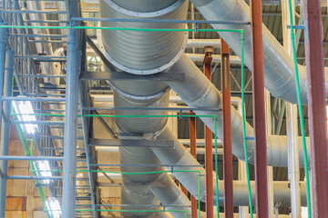 Pipes and ventilation ducts in large industrial plants.