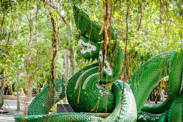 June 7th,2022 A green Naga statue  at Wat PA Klong11 ( Naga Temple ) in Pathum Thani city, Thailand