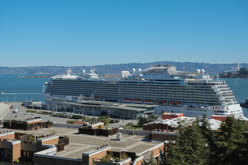 Princess cruiseship or cruise ship liner Royal P in San Francisco port Bay terminal sail away...