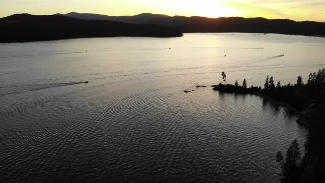 Aerial footage of sunset over Lake Couer De'Alene