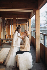 Loving couple on a ranch in the west in winter