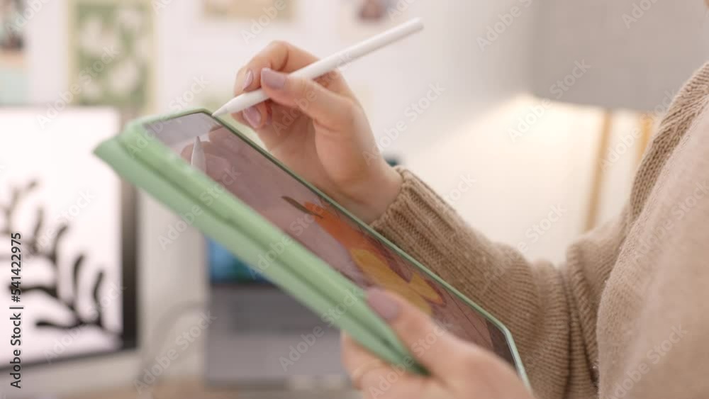 Poster hands of graphic designer drawing on a tablet, working on orange fruit design or digital sketch artw
