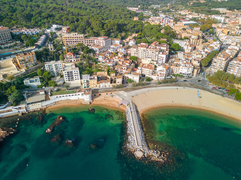 Sant Feliu de Gu&iacute;xols on the Costa Brava of Gerona tourist beach turquoise Mediterranean sea panoramic view aerial view