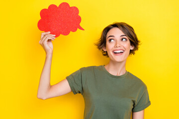 Portrait of nice pretty positive girl with bob hairstyle wear khaki t-shirt look at red mind cloud isolated on yellow color background