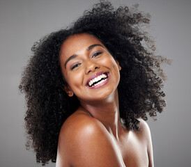 Black woman, smile and hair for face, makeup and happy with beauty, afro and cosmetics in studio...