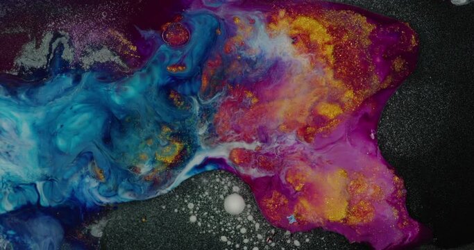 Colored liquid abstract explosion footage. Cloud of ink. swirling softly. 4K.