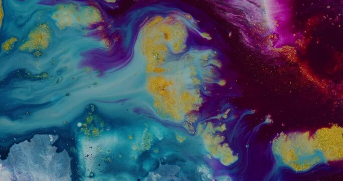 Abstract colored liquids mix and flow slowly. Color ink. Collision colors. 4K.