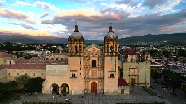 drone shot of santo domingo temple world heritage site in oaxaca city mexico at sunset