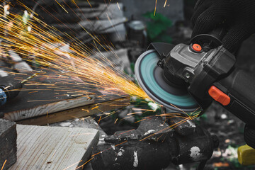 Metal grinding. Working with an angle grinder. Rust cleaning.