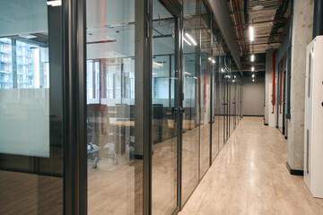 Modern premises of the office center, transparent partitions offices