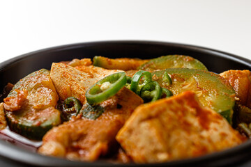 zucchini stew on a white background