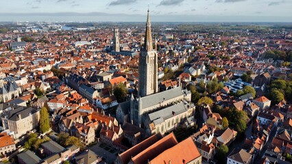 Naklejka premium drone photo Eglise notre dame de Bruges, Onze-Lieve-Vrouwekerk Bruges Belgique europe