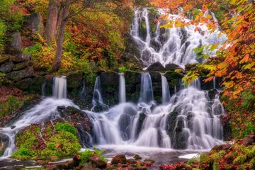 Fotobehang Beautiful waterfall in autumn forest in Jonkoping, Sweden. Long exposure. © PhotosbyPatrick