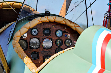 Cockpit detail and flight control panel of a vintage plane