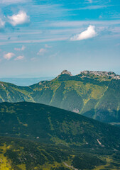 High rocky mountains, mountain view from the top. Mountains in Poland, High Tatras, view from Kasprowy Wierch.