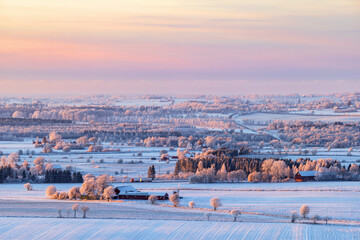 View of the countryside in the twilight at winter