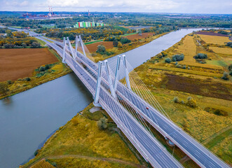 Modern Cardinal Macharski bridge over the Vistula River, Kraków, Poland, Europe, aerial view 