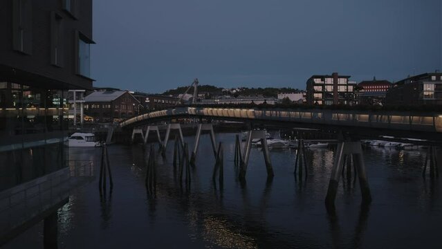 A Static Shot Of Flower Bridge On The River Nidelva And Shopping Area Solsiden In The Trondheim