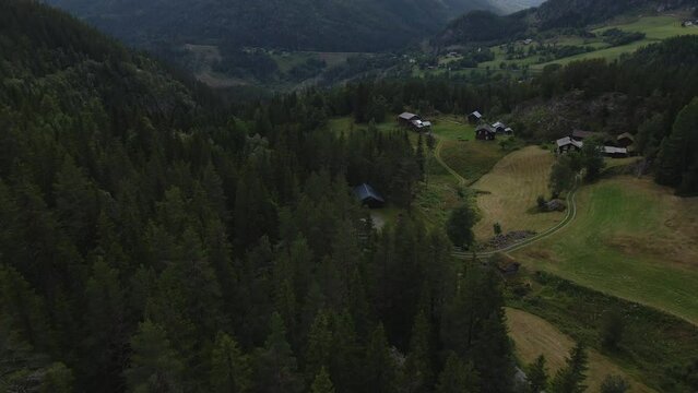 A panoramic view of a national park towards mountain ranges and hills covered by cold rain-forests