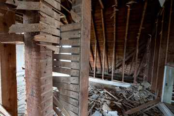 Fototapeta premium Building work underway in a suburban Edwardian house in Pinner, northwest London UK. The builder is taking the house back to brick.