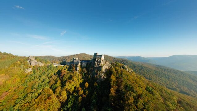 Smooth, ascending FPV rotation around Aggstein in stunning autumn light. Wachau, Austria.