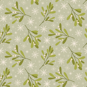 Seamless pattern of mistletoe sprigs surrounded by snowflakes and small stars.
