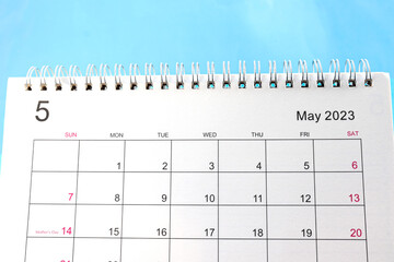 close-up of calendar month of May 2023 on a blue background