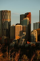 Vertical shot of the Bow and other skyscrapers and surrounding buildings in Calgary, Alberta, Canada