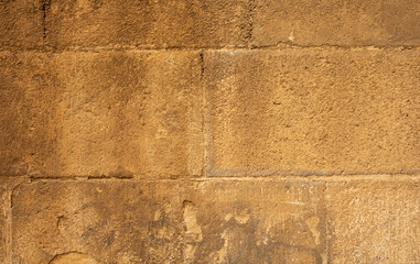 Sandstone brick wall background. Texture.