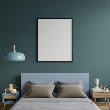 Poster mockup with vertical frames on empty dark green wall in bedroom interior.