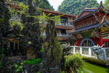 Ipoh, Malaysia - October 2022: Views of the Sam Poh Tong Temple, Chinese temple built within a limestone cave on October 19, 2022 in Ipoh, Malaysia..