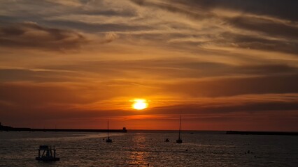 Fototapeta na wymiar beautiful sunset on the coast over the sea. sunset from the beach.
