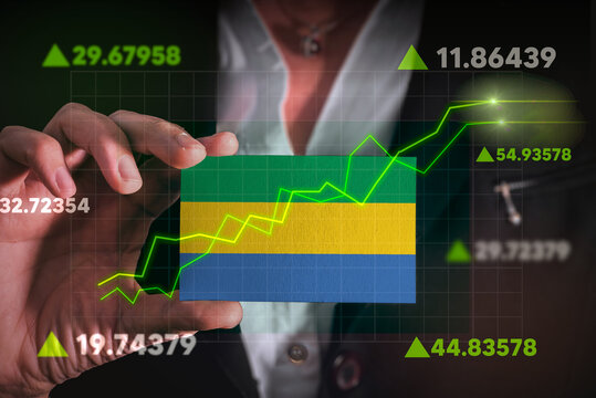 Graph growing up in Front Of Gabon Flag. business state growing up concept.
 - Powered by Adobe