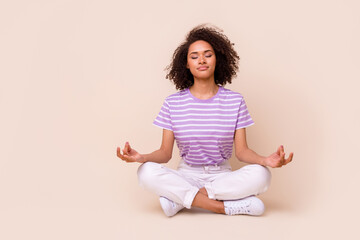 Full body size photo of young attractive pretty woman sitting crossed legs closed eyes meditation...