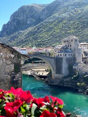 Vertical shot of a historical old bridge in Mostar © Unknown Unknown5660/Wirestock Creators