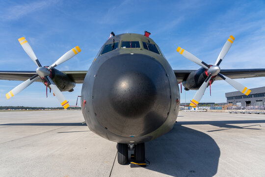 Closeup shot of black military aircraft transall c160 with blue sky in the background