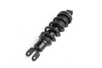 close up of black rear shock absorber for motorbike isolated on white background