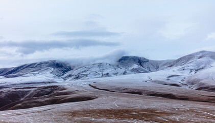 landscape with snow and clouds