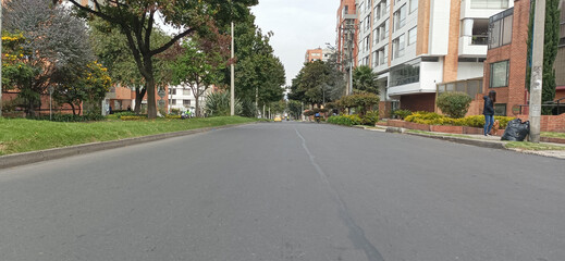 Empty cedritos neghborhood street durin bogota colombia no car day at north of the city 
