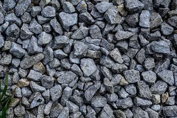 Slag in the form of small gray stones close-up. Top view, copy space.