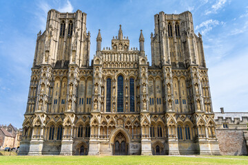 Fototapeta na wymiar Wells Cathedral is an Anglican cathedral in Wells, Somerset, England, dedicated to St Andrew the Apostle. It is the seat of the Bishop of Bath and Wells, whose cathedra it holds as mother church of th