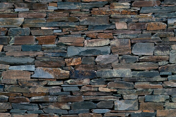Old rustic slate stonework wall