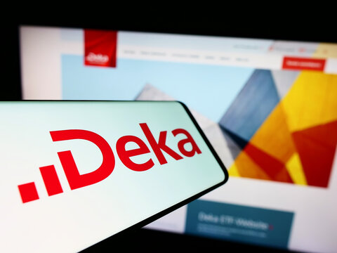 Stuttgart, Germany - 10-23-2022: Mobile phone with logo of DekaBank Deutsche Girozentrale on screen in front of company website. Focus on center of phone display.